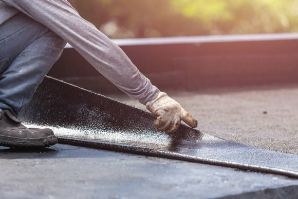 Professional Basement Waterproofing technician working in Brooklyn, MI